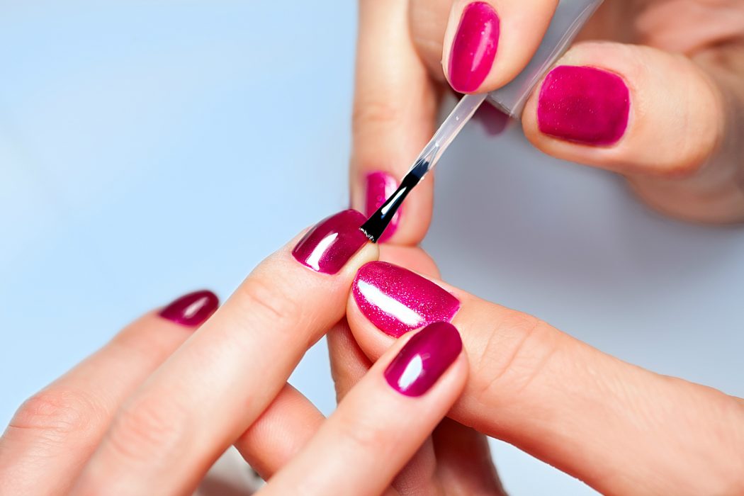 applying nail polish1 +15 Hottest Caviar Manicure Creative Ideas to Apply - 13