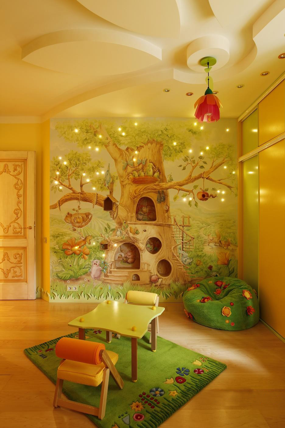 stunning-tree-wallpapers-for-childrens-room-decoration-with-floral-lighting-in-ceiling-as-well-small-table-and-chair-on-green-rug-as-well-wooden-laminate-floor