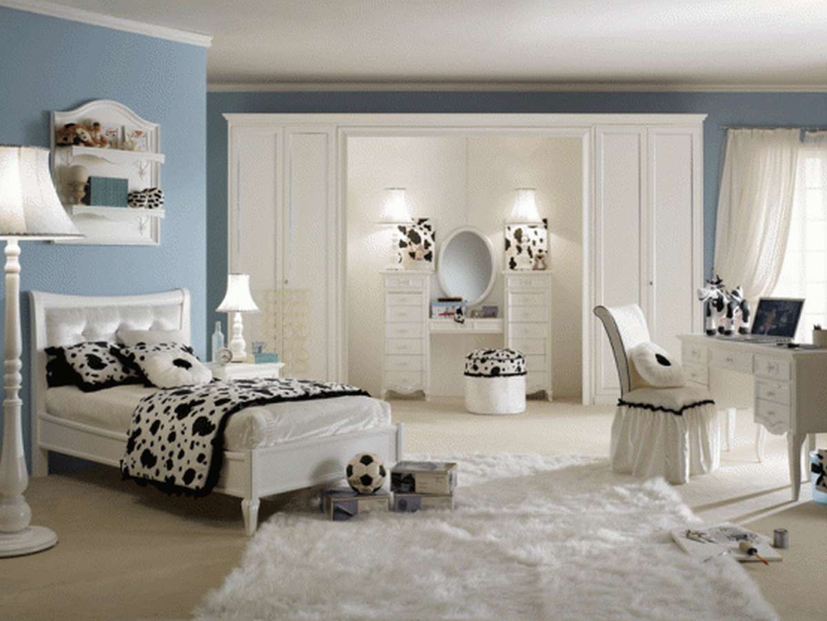 fancy-blue-wall-paint-color-background-with-black-and-white-cow-bedroom-theme-decor-plus-cream-area-rug-design