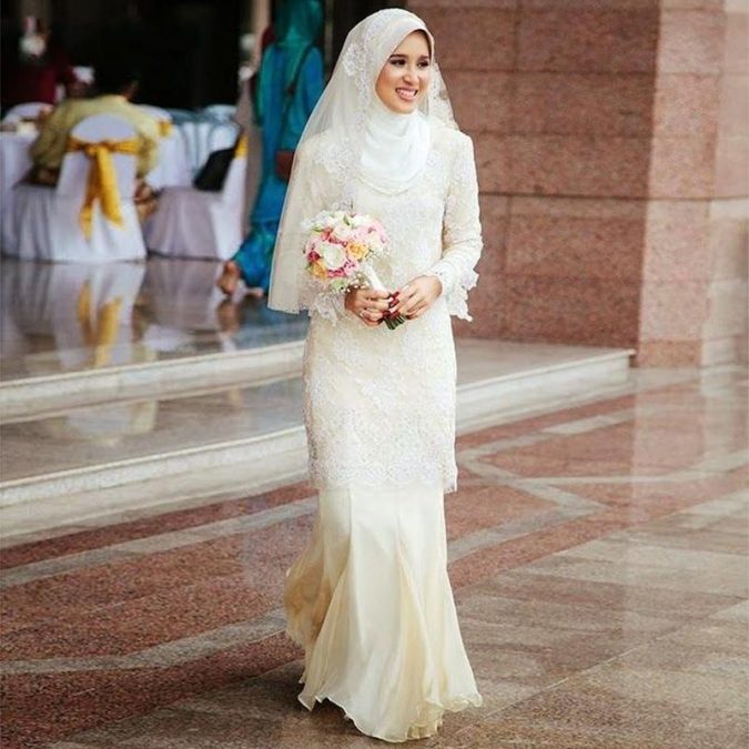 Textured sleeves wedding dress4 5 Stylish Muslim Wedding Dresses Trends - 5