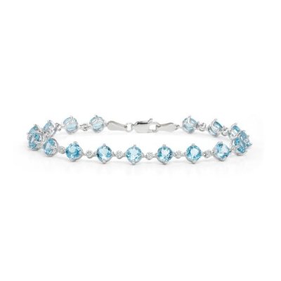 How To Hide Skin Problems And Wrinkles Using Jewelry? 40 14k White Gold Blue Topaz and Diamond Bracelet