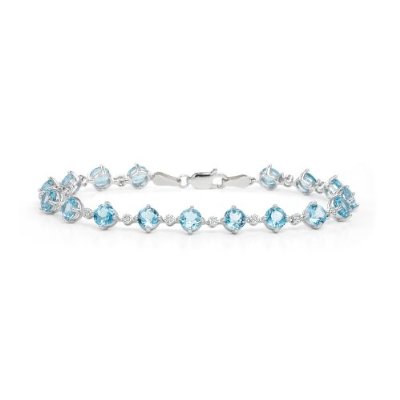 14k-White-Gold-Blue-Topaz-and-Diamond-Bracelet How To Hide Skin Problems And Wrinkles Using Jewelry?