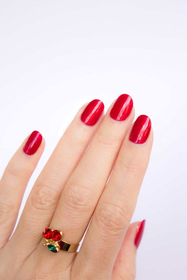 perfect-red-nails-oval-shape 125 years of Fingernails Trends Development