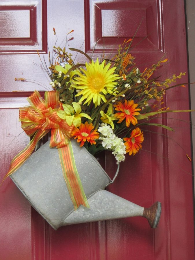 Watering-can-with-flowers-front-door-decoration-2-675x900 7 Vibrant Front Door Decorations for Summer 2020