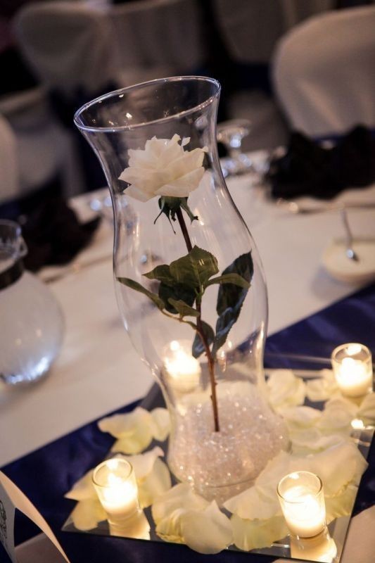 79+ Insanely Stunning Wedding Centerpiece Ideas 111 single flower wedding centerpieces 1 79+ Insanely Stunning Wedding Centerpiece Ideas - 111