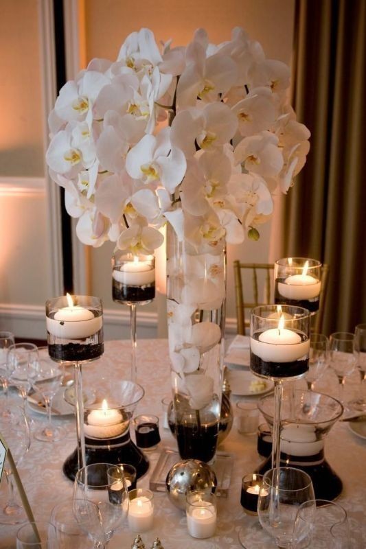 79+ Insanely Stunning Wedding Centerpiece Ideas 136 tall wedding centerpieces 11 79+ Insanely Stunning Wedding Centerpiece Ideas - 136