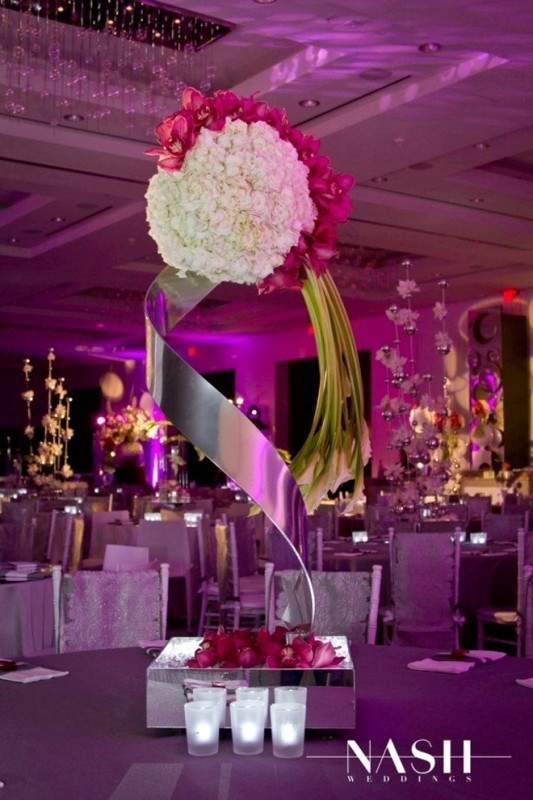 79+ Insanely Stunning Wedding Centerpiece Ideas 134 tall wedding centerpieces 9 79+ Insanely Stunning Wedding Centerpiece Ideas - 134