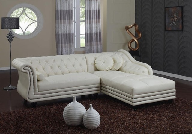 traditional white leather sectional sofa with chaise and cushions 5 Outdated Home Decor Trends That Are Coming Again - 39