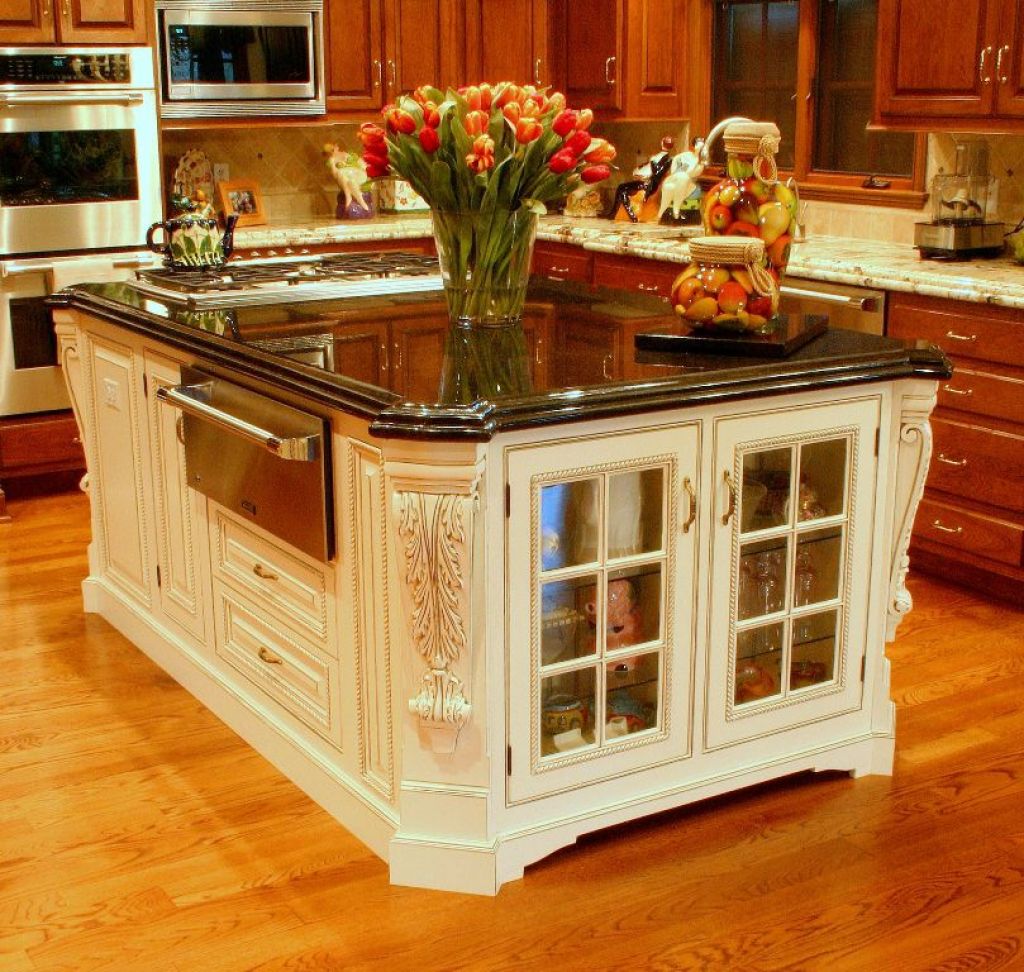 carved-kitchen-island-with-glass-doors 6 Affordable Organizing and Decoration Ideas for your Kitchen