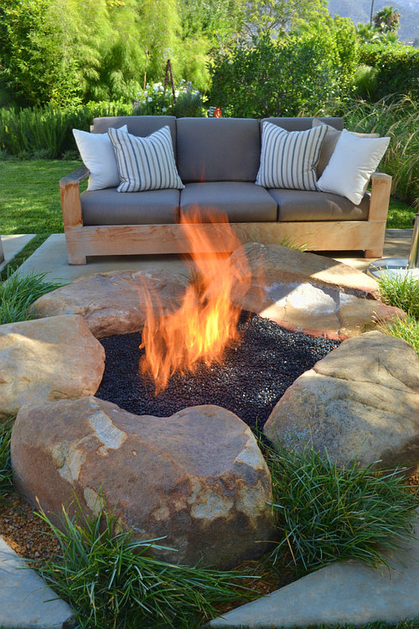 contemporary-patio-with-rustic-firepit 8 Delightful and Affordable Fire pit Decoration Designs in 2022