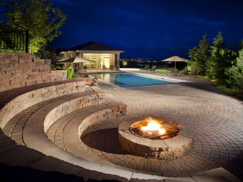 fire-pit-around-pool_0 8 Delightful and Affordable Fire pit Decoration Designs in 2022
