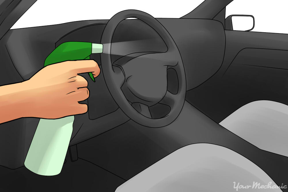 4 How to Get Rid of the Smell of Tobacco From Your Car fabric freshener Febreze being sprayed into car 5 Common Car Smells.. and How to Remove Them? - 2