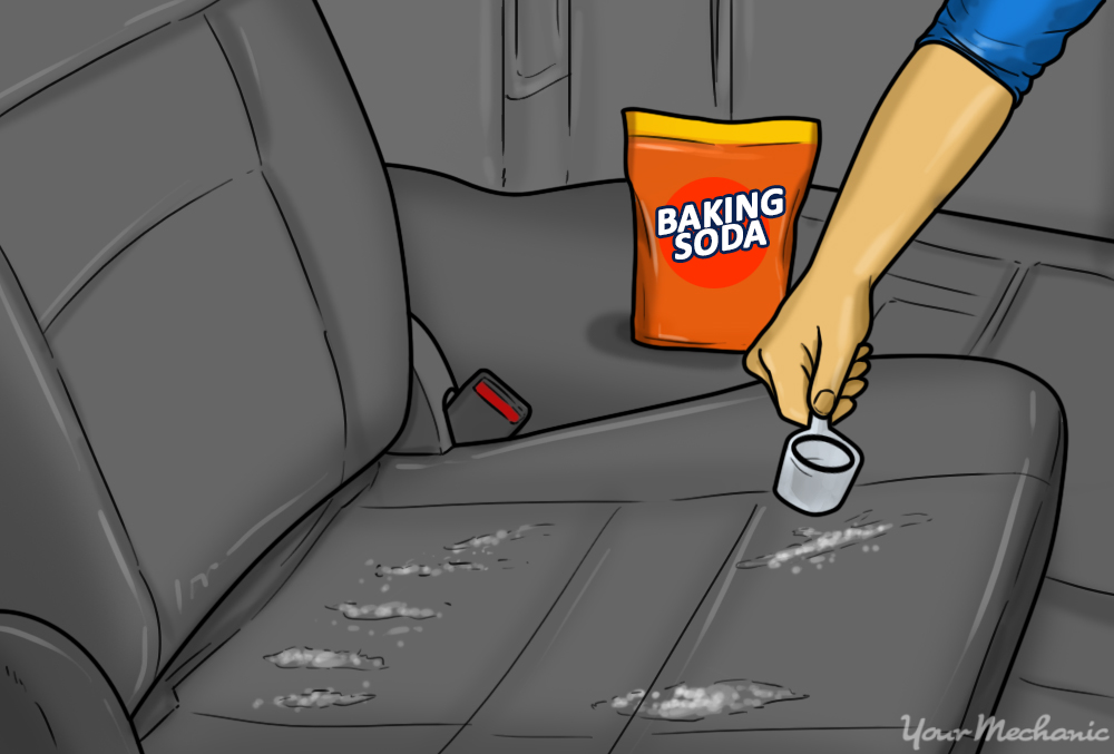 4 How to Remove the Odor of Sour Milk From Your Car baking soda being applied to a car seat 5 Common Car Smells.. and How to Remove Them? - 7