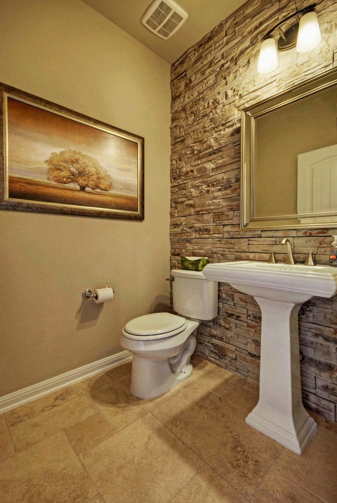 powder room half bathroom stone tiled wall 2 Top 10 Stunning Powder Room Decorating Ideas - 18