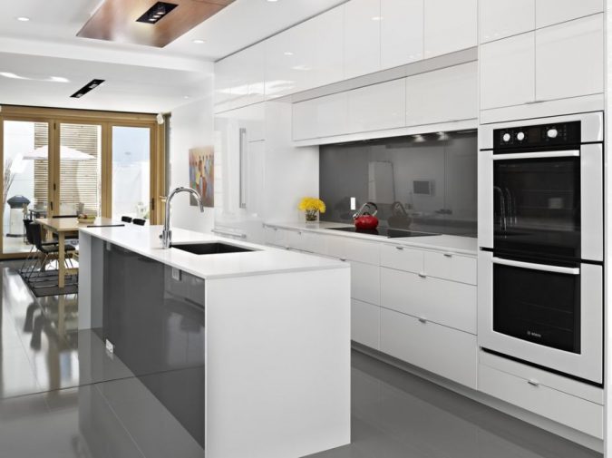 white kitchen with glossy cabinets Top 10 Best White Bright Kitchen Design Ideas - 11