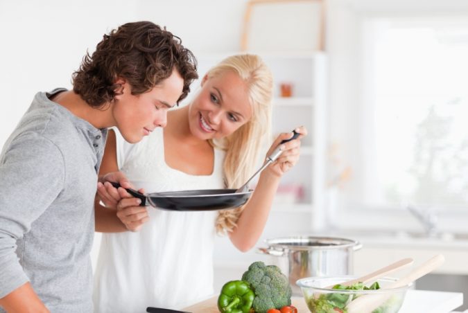 couple making dinner 5 Must-have Moments Every Couple Should Experience - 1