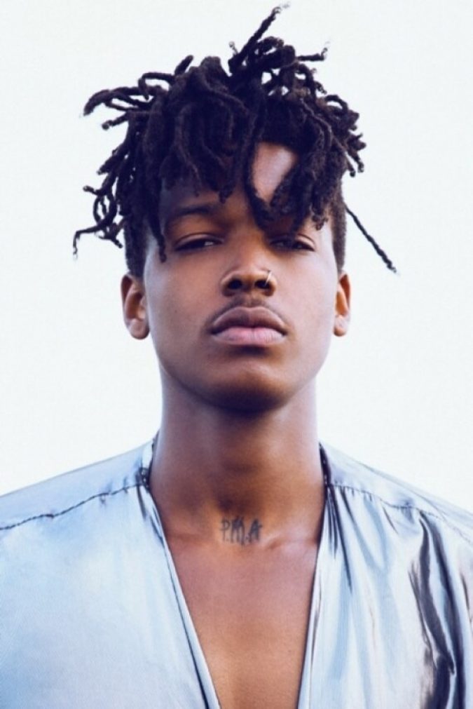 curly-hairstyle-Long-Top-Short-Sides-and-Back-675x1011 7 Crazy Curly Hairstyles for Black Men in 2020