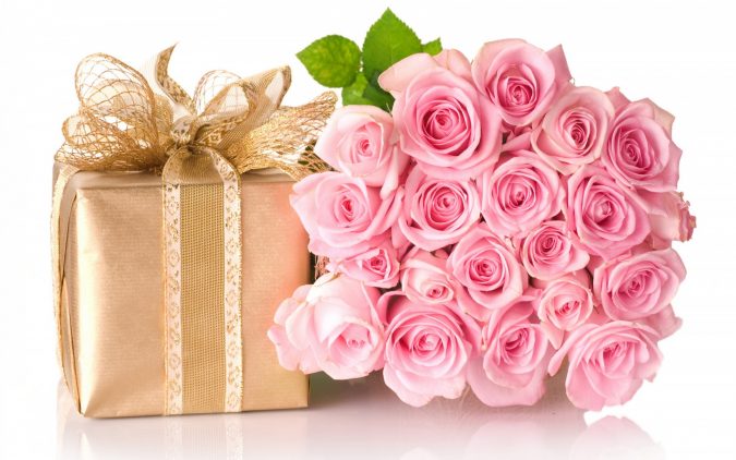 gift and roses boquet 15 Best Things to Consider Before Presenting a Gift - 13