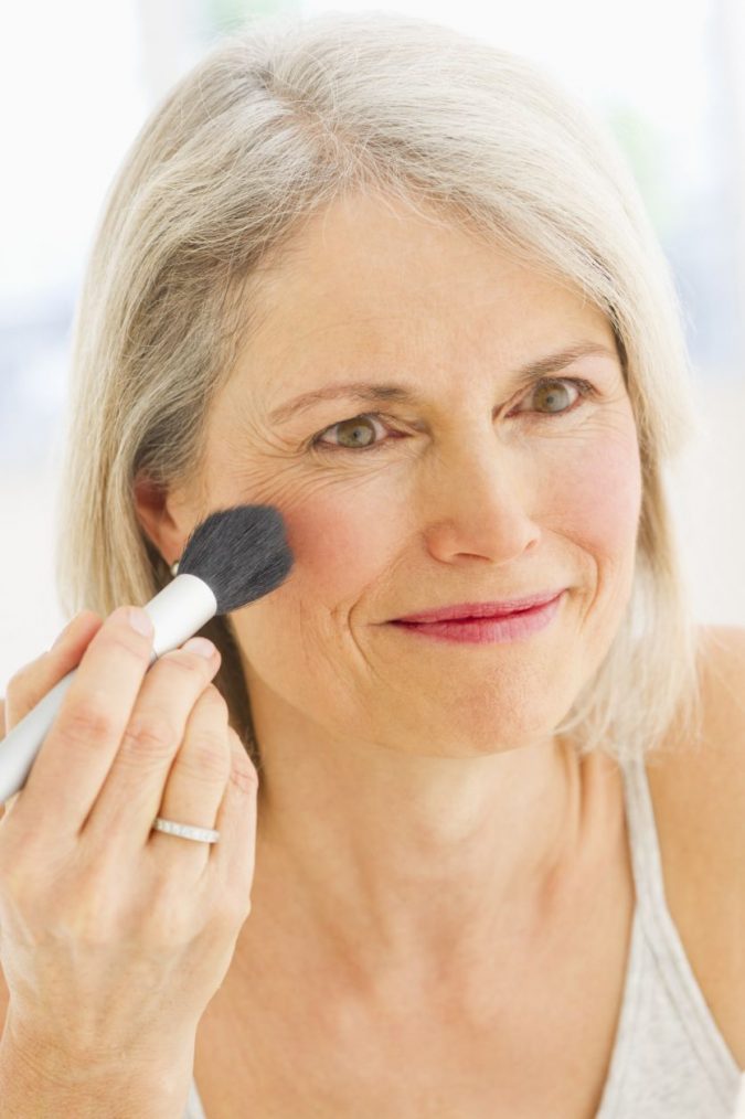 applying-blush-mature-makeup-675x1014 Top 10 Makeup Tricks to Look Younger