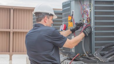furnace technician working on heat pump Top 10 US Areas Need Furnace Repair services - 25