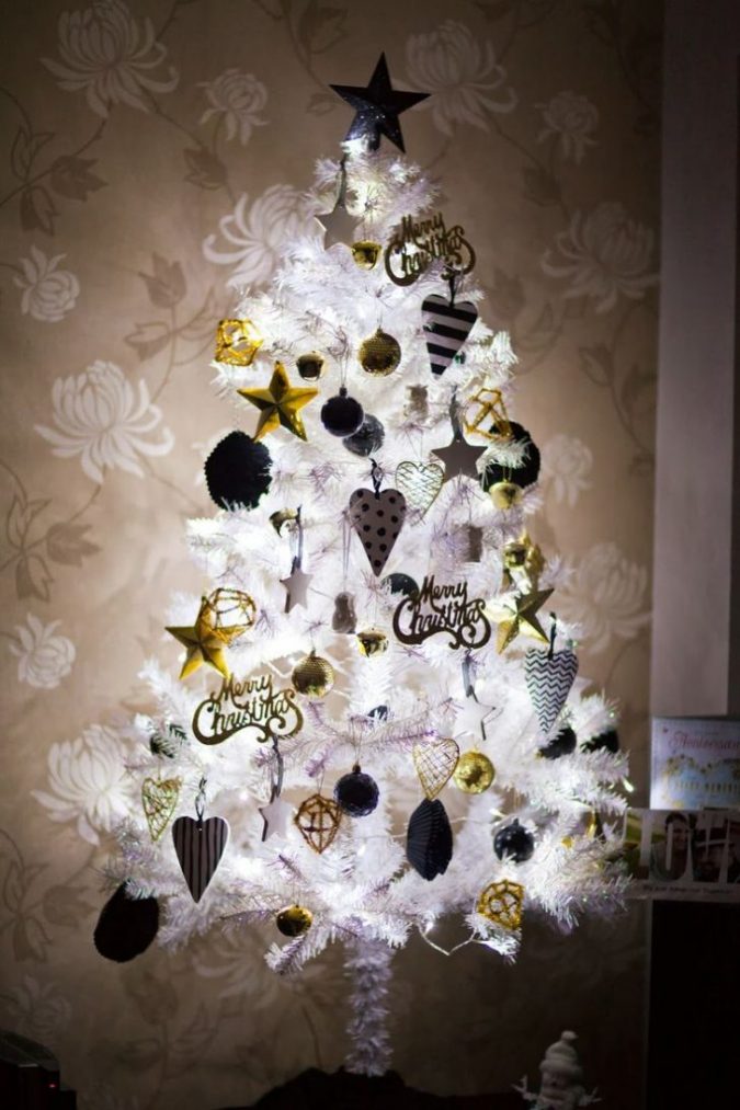 white Christmas tree with black and gold decoration Top 10 Christmas Decoration Ideas & Trends - 17