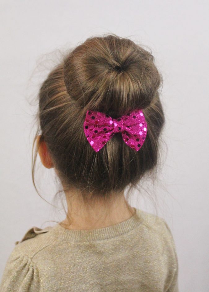 small bun school hairstyle little girl Top 10 Best Girl’s Hairstyles for School - 9