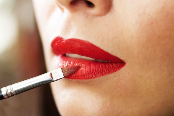 apply red lipstick 7 Tricks to Keep Your Lipstick Last Longer - 8