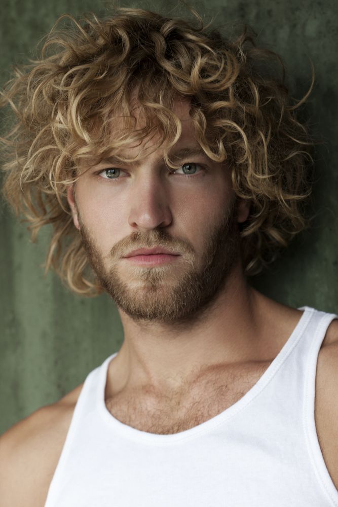 long curly hairstyle for blonde men Top 10 Hairstyles for Guys with Blonde Hair - 15