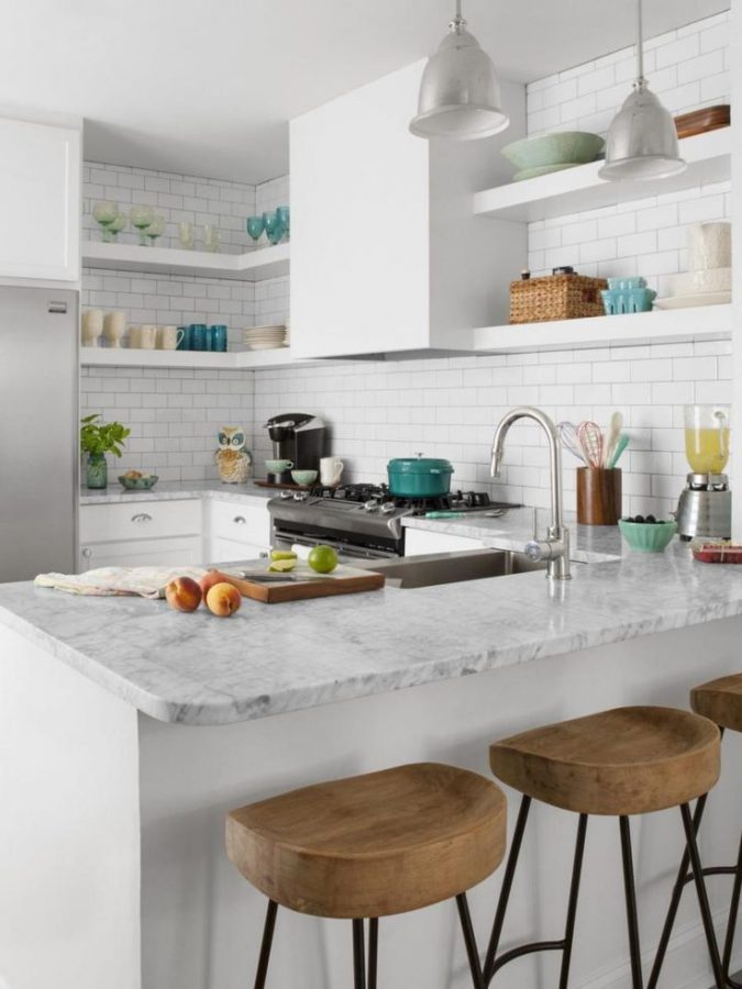small white kitchens with open cabinets and colorful dishware 10 Outdated Kitchen Trends to Avoid - 5