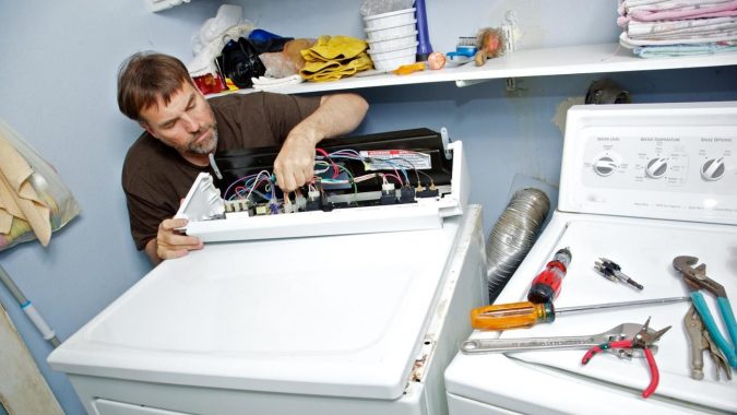 Top 10 Washing Machine Parts That Need Repair in Canada 20 technician washing machine repaire Top 10 Washing Machine Parts That Need Repair in Canada - 20