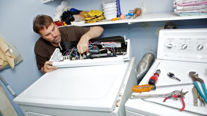 technician-washing-machine-repaire-675x380 Top 10 Washing Machine Parts That Need Repair in Canada