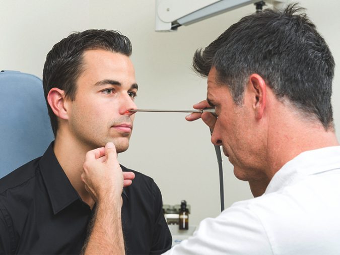 doctor checking patient nose dry air Top 10 Unexpected Problems of Dry Air and How to Avoid - 10