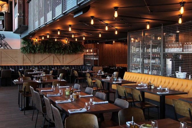 4 Ways Restaurants Can Go Green with Technology 5 Cargo restaurant Energy saving light bulbs 4 Ways Restaurants Can Go Green with Technology - 5