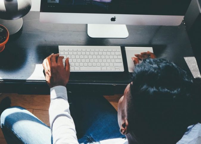 7 Ways to Get Secure Online and Regain Your Privacy 8 computer man typing 7 Ways to Get Secure Online and Regain Your Privacy - 8