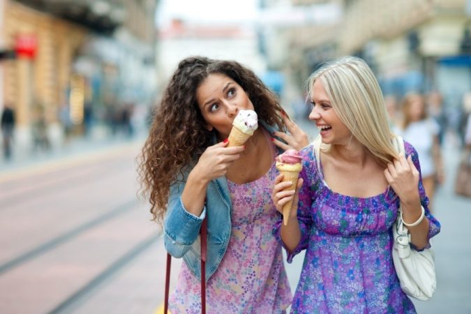friends eating ice cream 8 Keys to Set Health Goals and Achieve Them - 14