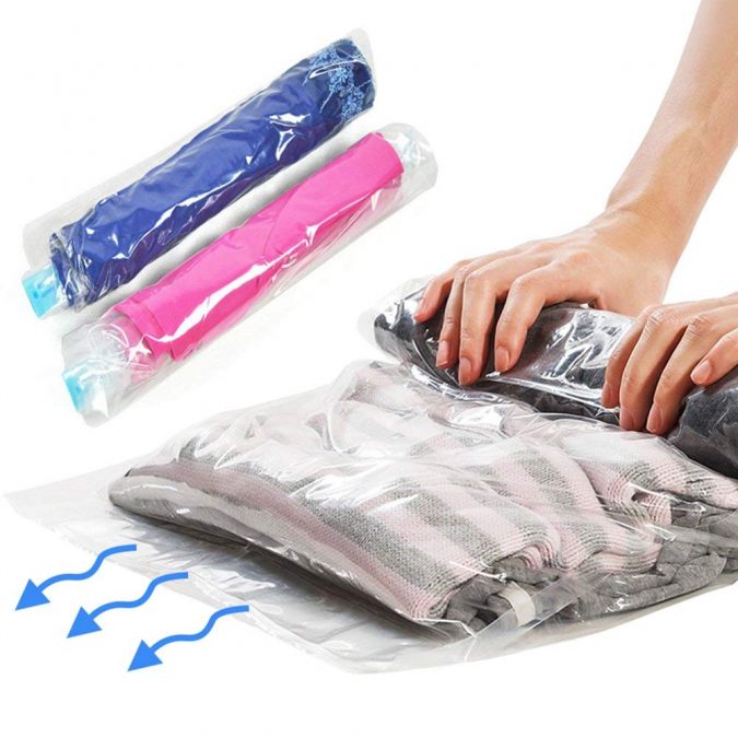 travel packing clothes in compressed bags rolled 10 Packing Essentials Tips for Your Next Adventure Holiday - 10
