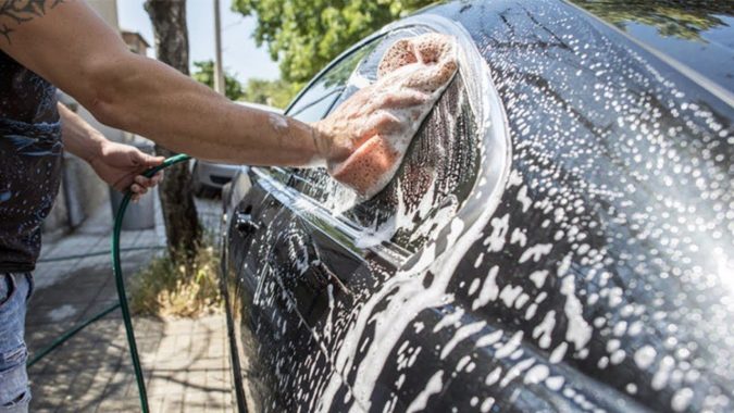 washing a car 10 Essential Car Maintenance Tips That You Should Know - 1