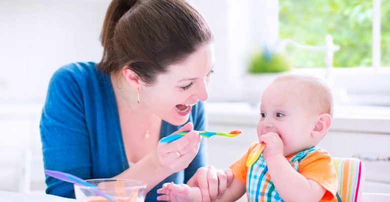mother feeding baby shutterstock 196099103 Baby Food Recipes: Making Your Own Baby Food is Simple and Healthy - Homemade baby food 1