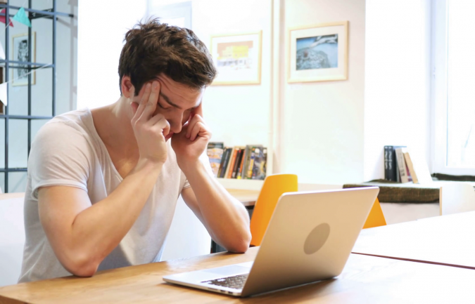 Transforming Your Part-Time Hobby into a Full-Time Profession 5 laptop headache upset tense at work Transforming Your Part-Time Hobby into a Full-Time Profession - 5