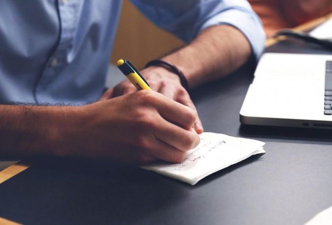 Top Resources and Practice Tests for Passing Microsoft MCSA Windows Certification Exams Easily 4 laptop writing notes Top Resources and Practice Tests for Passing Microsoft MCSA Windows Certification Exams Easily - 4