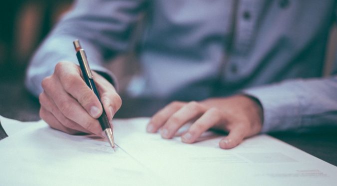 California Birth Certificates Now Recognize a Third Gender Option 4 man writing California Birth Certificates Now Recognize a Third Gender Option - 4