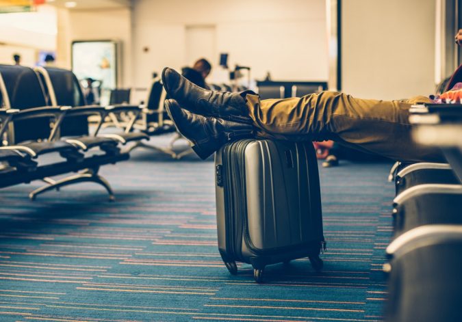 delayed flight waiting 5 Travel Tips to Help You Save (Or Gain) Money on Your Next Trip - 4