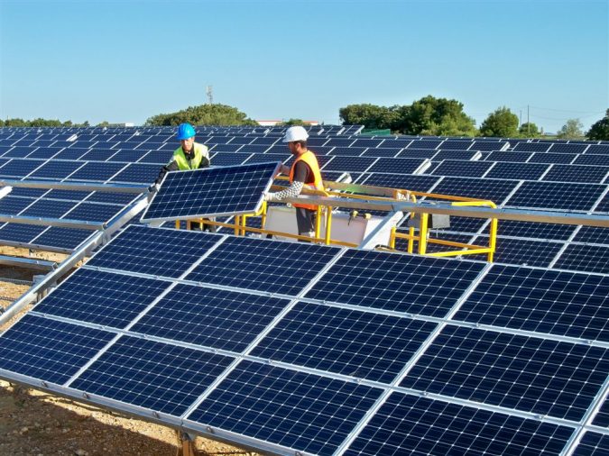 10 Reasons You Must Change to Solar Energy 10 installing solar panels 2 10 Reasons You Must Change to Solar Energy - 10
