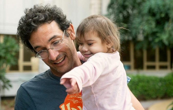 man playing with child Rare Genetic Disorder: 5 Ways to Show a Family Emotional Support - 3