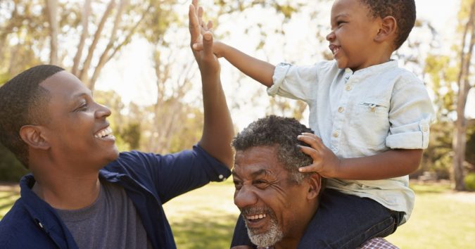 men playing with child Rare Genetic Disorder: 5 Ways to Show a Family Emotional Support - 1