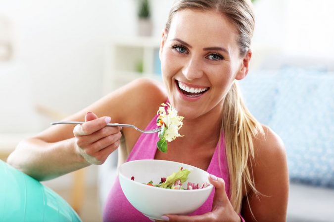 woman-eating-675x450 How Healthy Eating Can Help Hair Growth