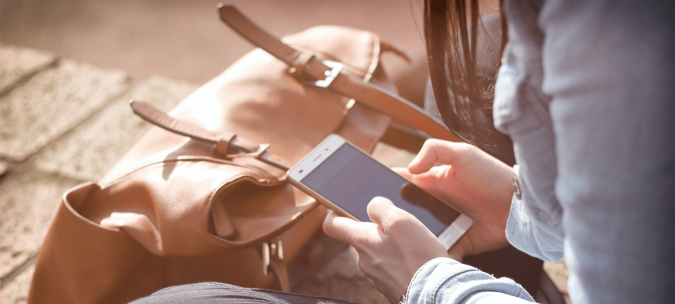 Top 5 Reasons to Use Cell Phone Tracker 6 woman using mobile Top 5 Reasons to Use Cell Phone Tracker - 6