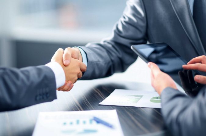 How to Start Your SME Tech Business 6 handshake business discussion How to Start Your SME Tech Business - 6
