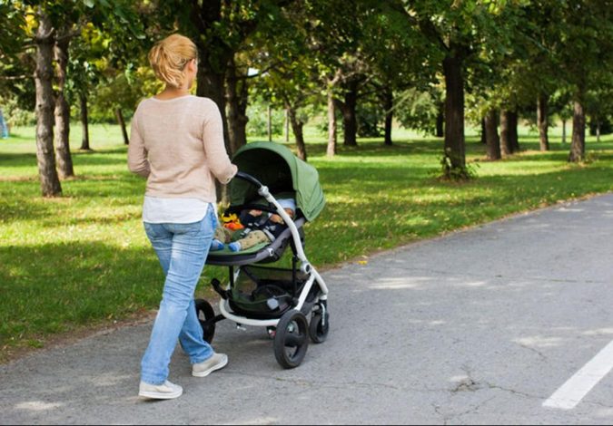 woman walking with baby in stroller e1564479403540 Weight Loss after a Baby - 7