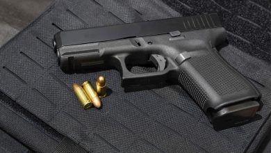 Hand Gun andbullets "Gun Control" vs. "Gun Rights" - Which Decision To Choose? - 96